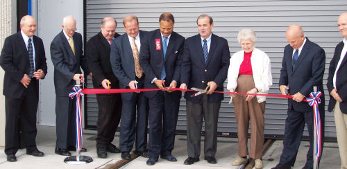cutting Cutting the ribbon: Rep. Tom Holbrook, St. Clair County Board Chairman Mike Kern, ---, Congressman Jerry Costello, St. Clair County Transit District Chair Dolores Lysakowski