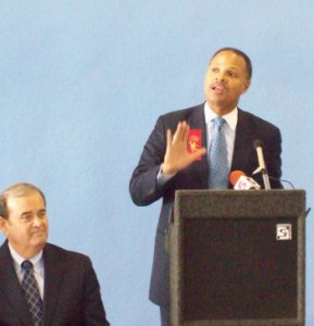 mayor East St. Louis Mayor Alvin Parks speaks at the ribbon cutting ceremony, as U.S. Congressman Jerry Costello listens.