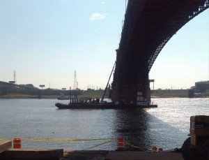 A barge and man-lift on the Mississippi River