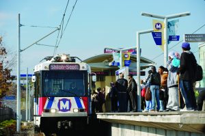 Passengers at the North Hanley MetroLink station on November 23, 2009.