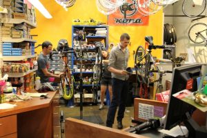 Technicians at work at Urban Shark and the Downtown Bicycle Station.