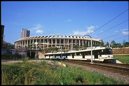 A MetroLink train approaches Busch Stadium in 1993.