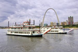both riverboats in front of arch