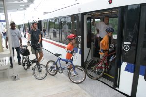 Family Boarding MetroLink with bikes