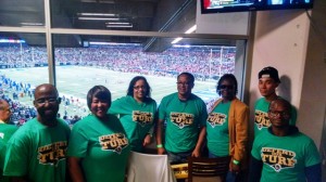 Metro employees volunteered with the Rams' Green Team and helped recycle at a game last fall.