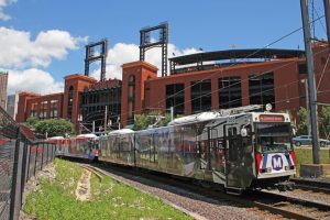20th anniv train departing with stadium in background
