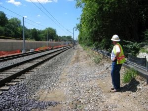 worker on train tracks