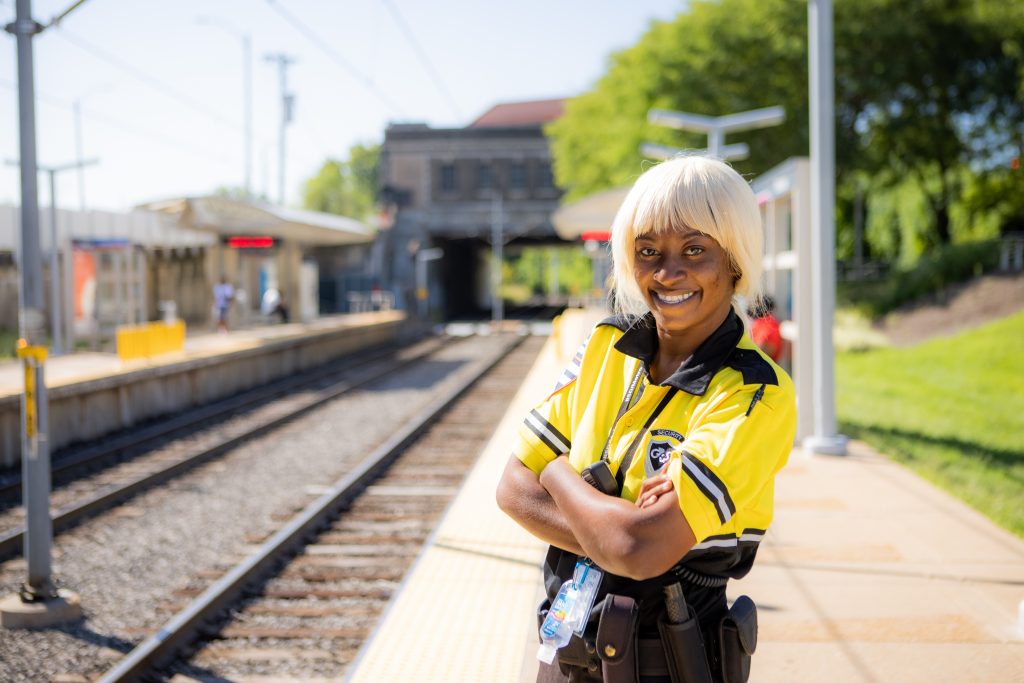 Image of security team member Erica standing on the Delmar MetroLink platform