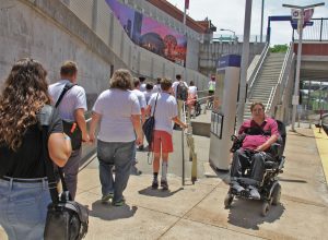 Man in a wheelchair at the Stadium MetroLink Station