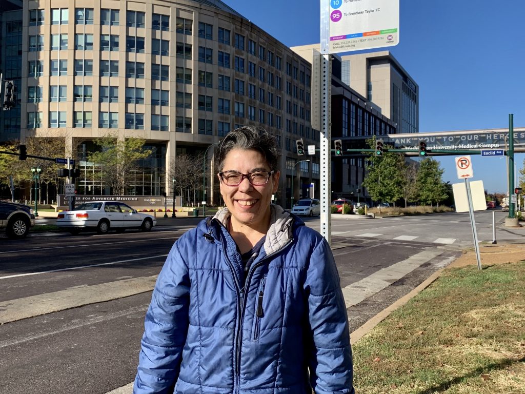 Image of passenger Rose standing in front of a bus stop at Forest Park and Euclid