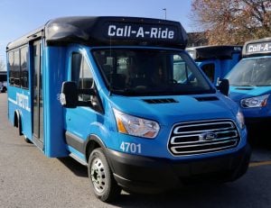New Metro blue Call-A-Ride vans shown from the front