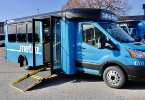 New Metro blue Call-A-Ride vans shown with the ramp down