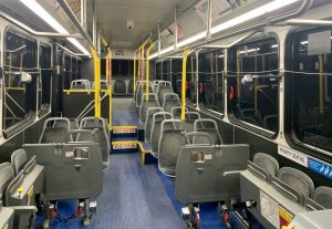 Interior shot of a MetroBus with gray seats