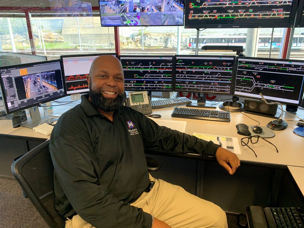 Photo of Lamont inside the MetroLink Control Center 