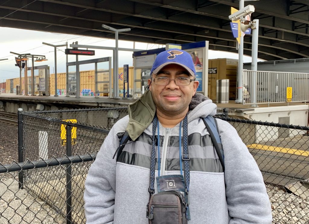 Passenger Kelly standing in front of the Grand MetroLink Station Platform
