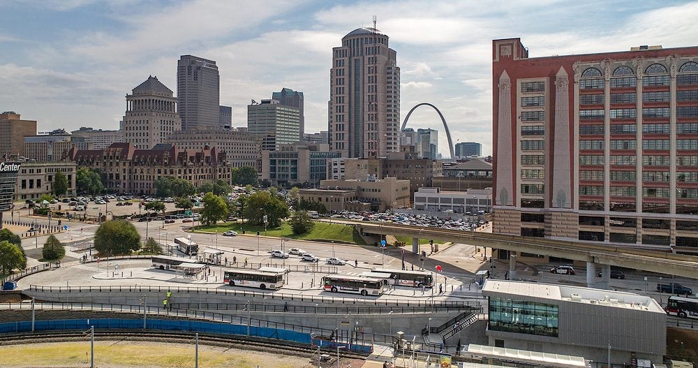 View of Civic Center Transit Center from a drone, looking east, with the Gateway Arch showing in the background