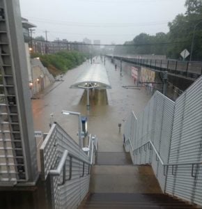 Flooding on MetroLink tracks at Forest Park-DeBaliviere Station