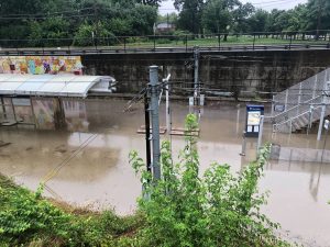 Flooding on MetroLink tracks at Forest Park-DeBaliviere Station