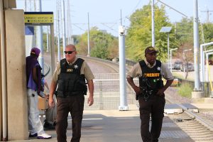 Security guards walking on MetroLink platform