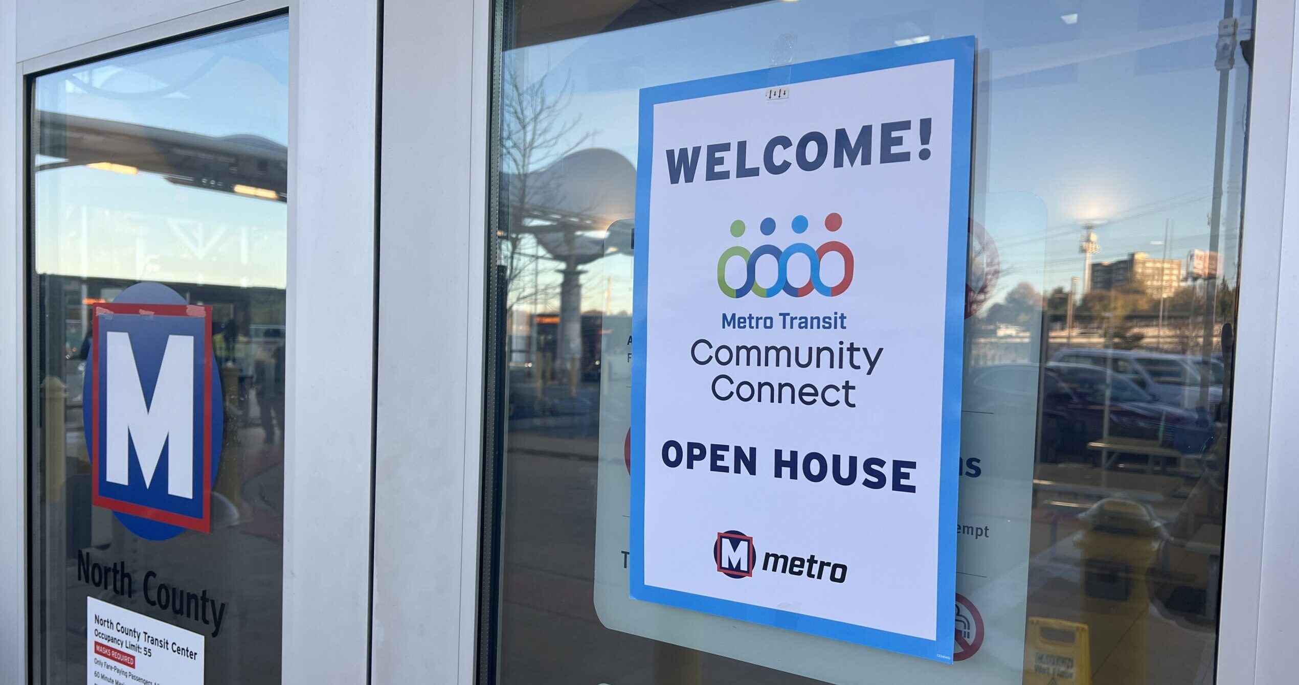 Community Connect sign on a transit center door