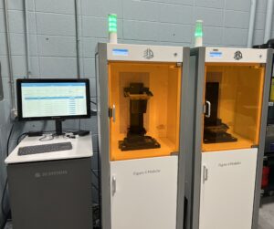 Two DLP 3D printers located in a room inside Central Facility